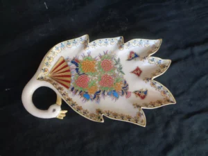 HAND CARVED WHITE MARBLE LEAF WITH PEACOCK HEAD AND GOLD PAINTING WORK
