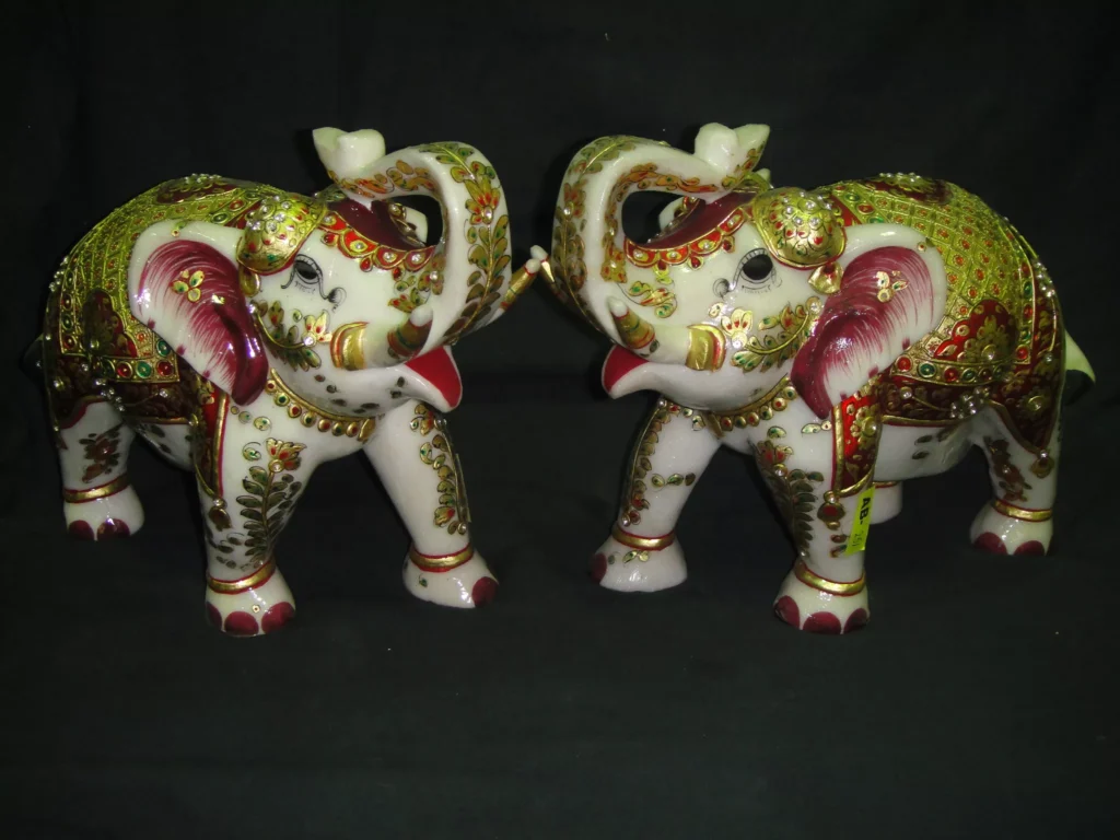 HAND CARVED SMALL MARBLE ELEPHANT WITH GOLD PAINTING WORK